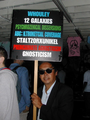 Tadah! Frank Chu in all his glory. If anyone can decipher his message, I'll buy them a Coke.