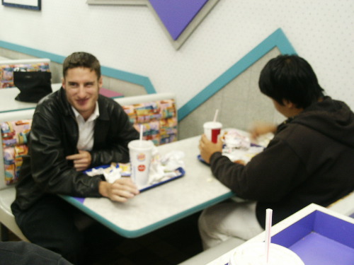 Paul and Ji enjoy the Whoppers, even though they will put pounds on you.
