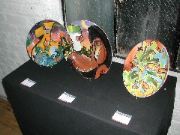 Three painted plates